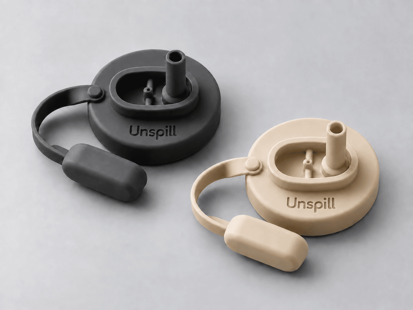 Two Unspill can covers in Charcoal and Oat